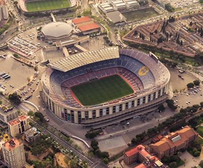 bright pink suitcase on city street next to parked car ideal for travel adventures and quick trips